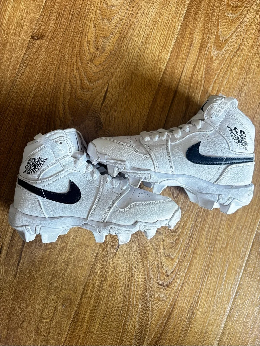Nike White High-Top Jordan Sneakers with Black Jumpman
